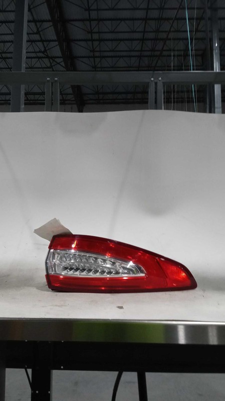 Used Left Tail Light Assembly fits: 2016 Ford Fusion quarter panel mounted LED H