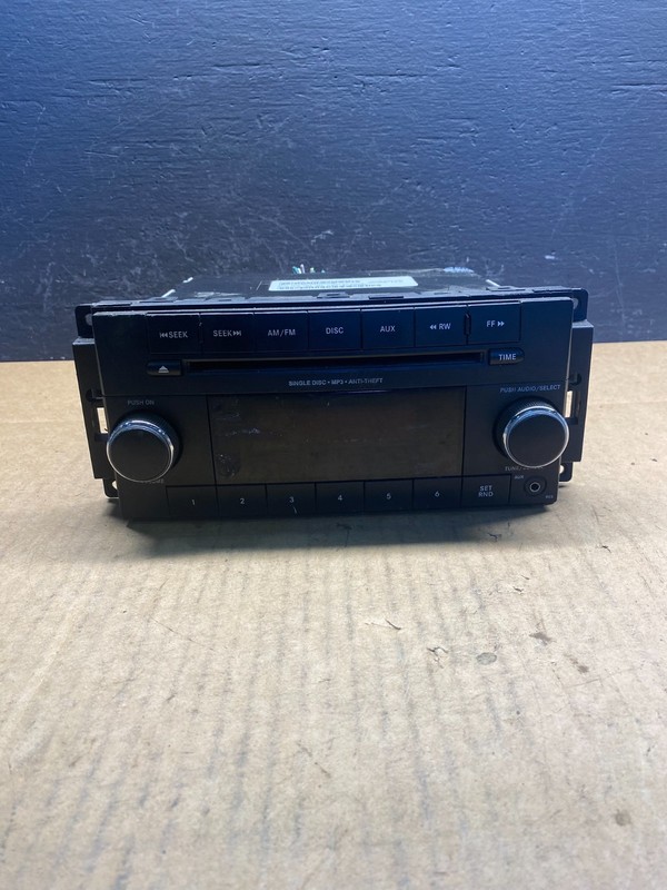 2007-2012 Chrysler Dodge Jeep Ram Radio CD MP3 AUX Receiver AC2785 DG