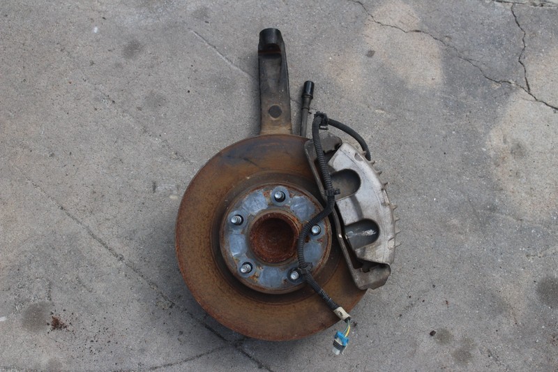 93-02 Camaro Firebird Knuckle LH Driver Side W/ Caliper and Rotor 18060620 *Used
