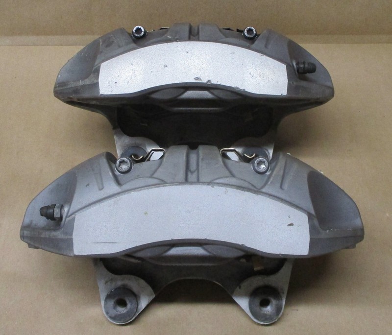 2020-2023 OEM TESLA MODEL Y BREMBO FRONT CALIPER SET - 20C84701 / 20C84702