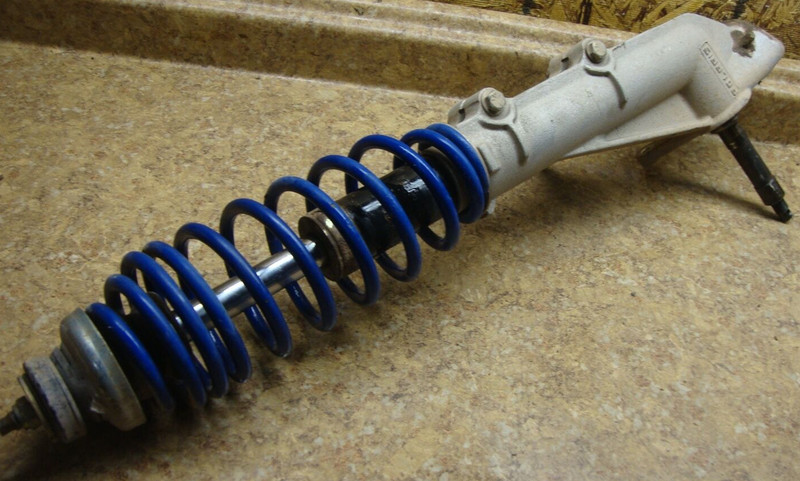 98 Polaris Xpress 300 ATV Express Right Front Shock Hub Carrior Strut Mount Blue