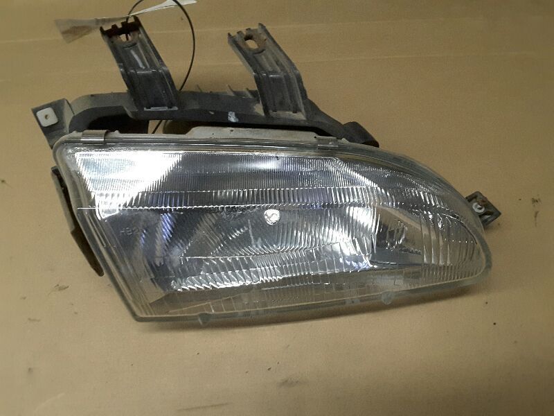 92 93 94 95 HONDA CIVIC R. HEADLIGHT 66878