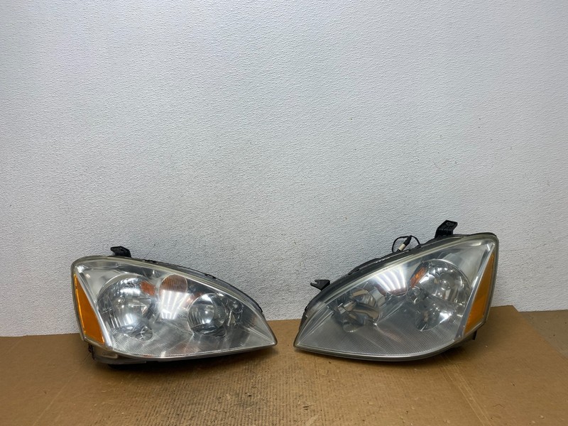 2002 to 2004 Nissan Altima Left+Right Side Set Halogen Headlights OEM AE1613 DW