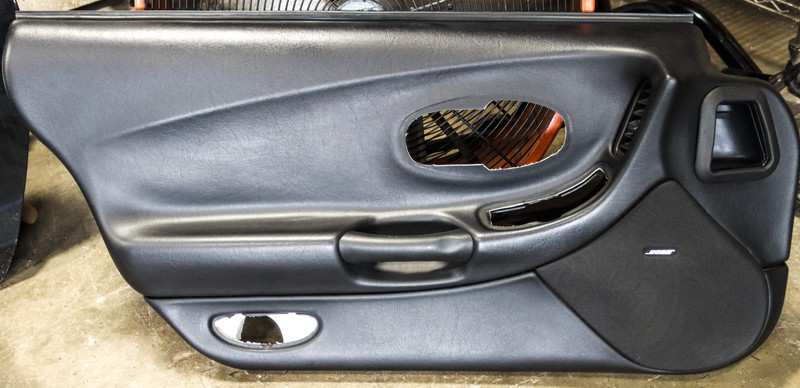 1997-2004 Chevrolet Corvette C5 Left Driver Door Panel Black OEM 10247319 *USED*