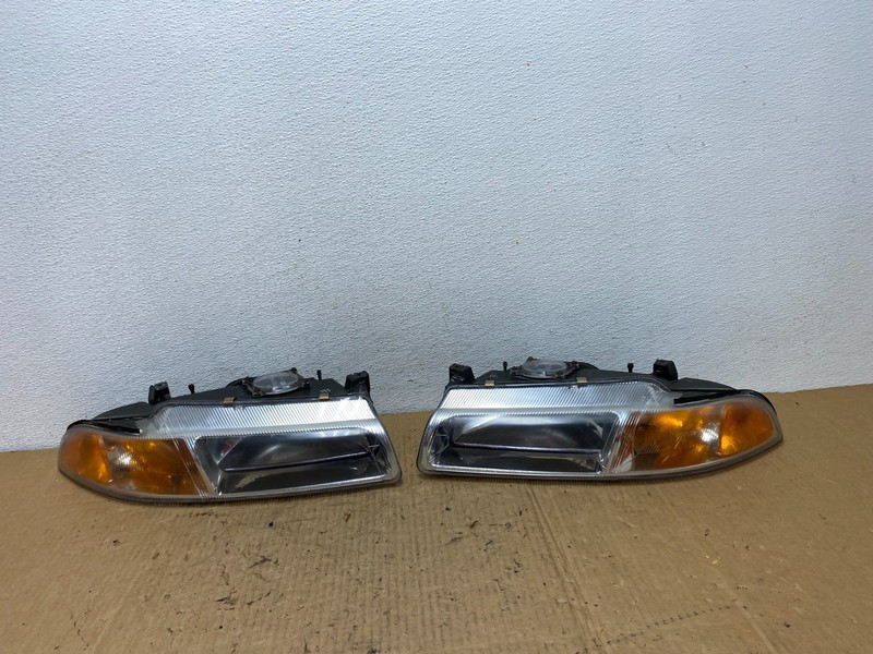 1995 to 2000 Dodge Stratus Left+Right Halogen Headlights AC8119 DW