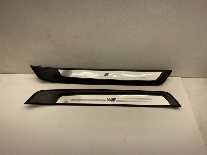 2012-2015 BMW X1 LEFT AND RIGHT FRONT OUTER DOOR SILL SCUFF PLATE TRIM COVER