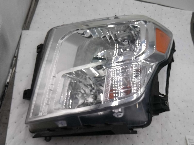 2018 Nissan Titan Left Headlight Assembly OEM White 79000 Miles Used