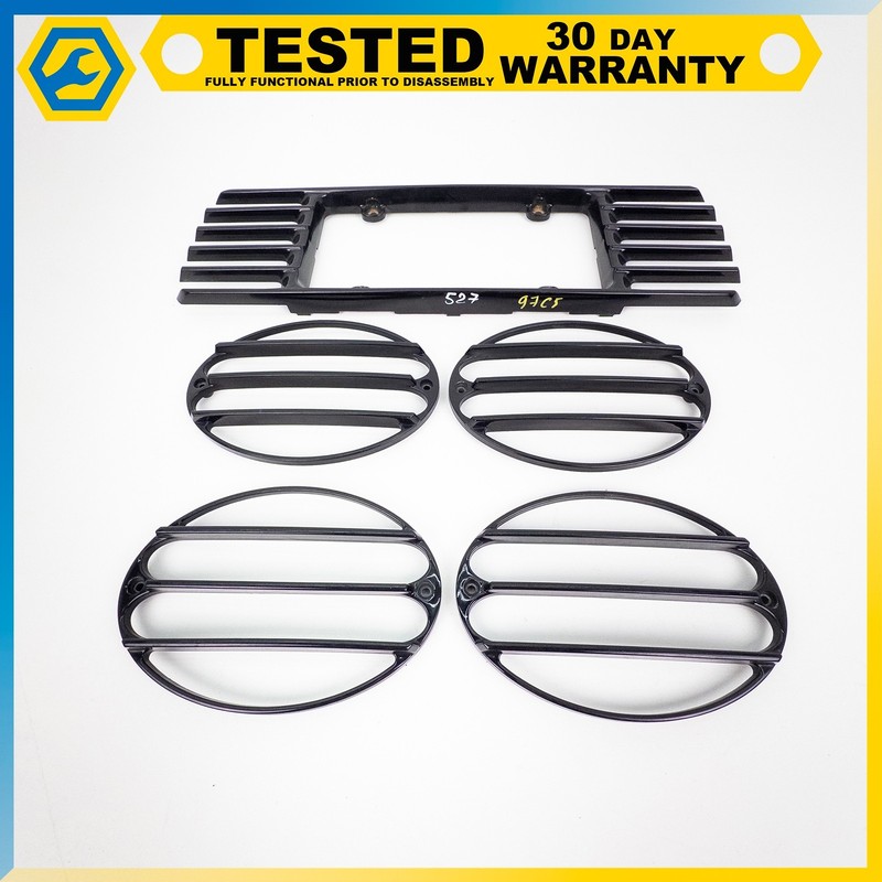 97-04 CHEVROLET CORVETTE C5 TAILLIGHT COVER GRILLES SET BLACK OEM