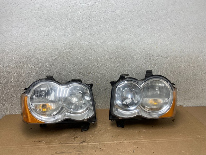 2008-2010 Jeep Grand Cherokee Left+Right Set Halogen Headlights AB4832 DW