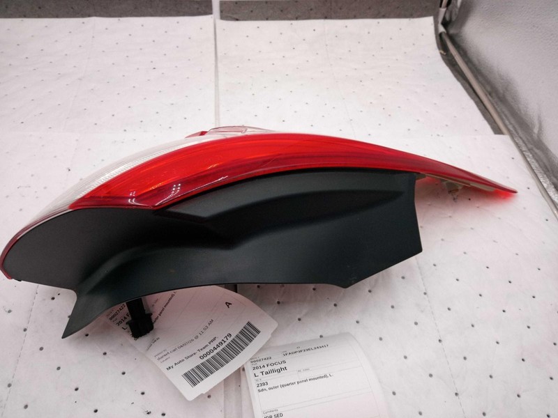 Used Left Outer Tail Light Assembly fits: 2014 Ford Focus Sdn outer quarter pane