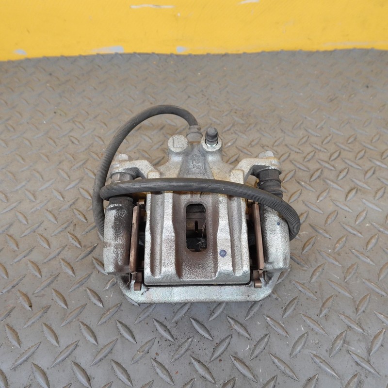 2005-2024 NISSAN FRONTIER REAR LEFT SIDE DISC BRAKE CALIPER OEM 44011EA04B