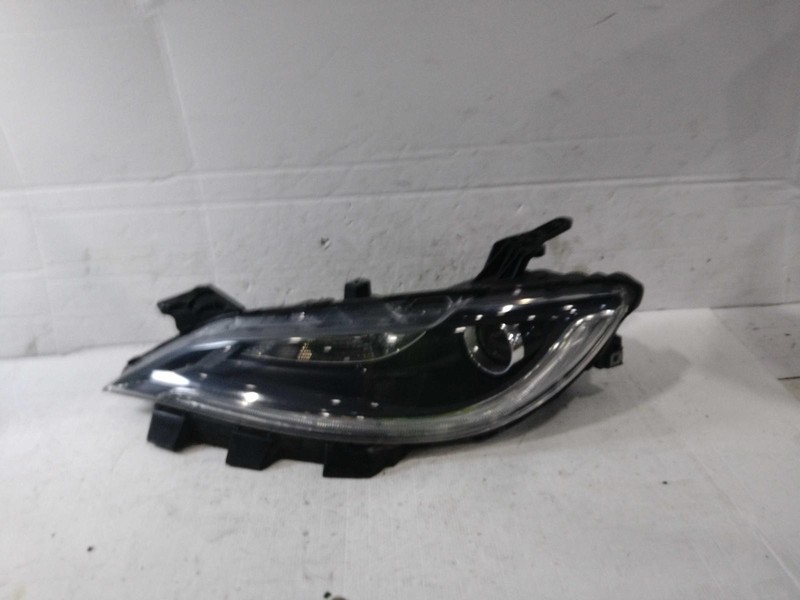 2015 Chrysler 200 Left Headlight Assembly Silver 114K Miles OEM Replacement
