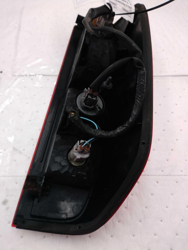 2013 Nissan Frontier Left Blue Tail Light Assembly OEM 576007 102K Miles