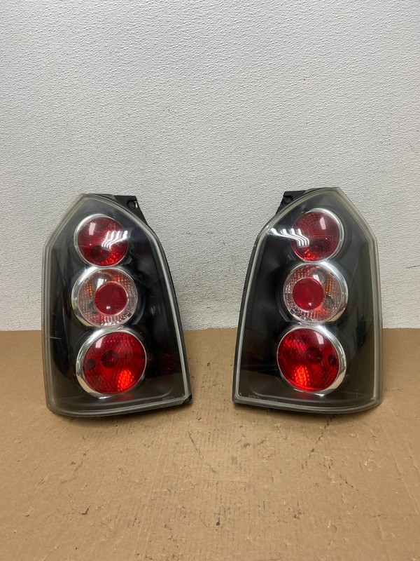2005 to 2009 Hyundai Tucson Left+Right Side Black Tail Lights AD8052 DG