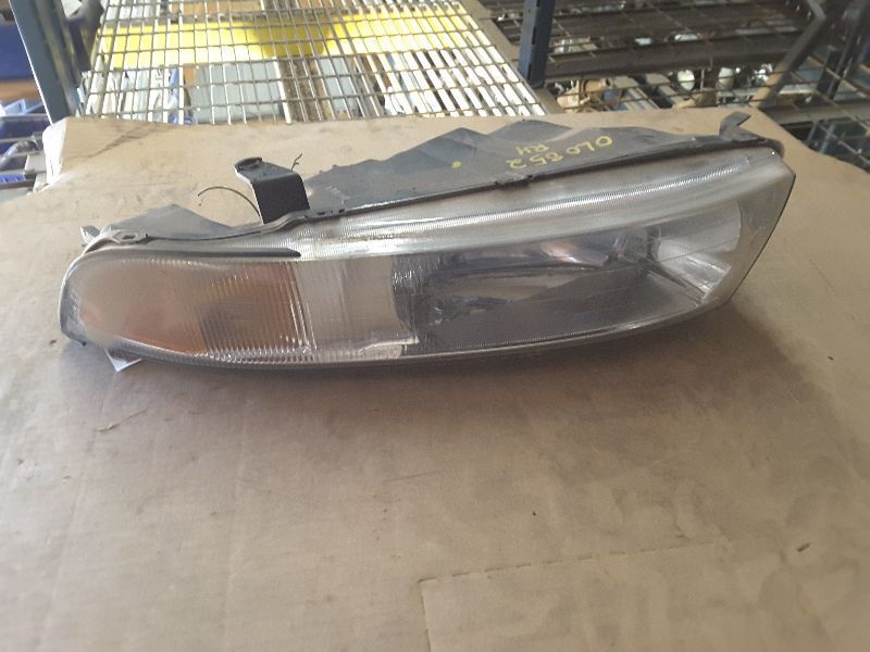 99 00 01 GALANT R. HEADLIGHT 67080
