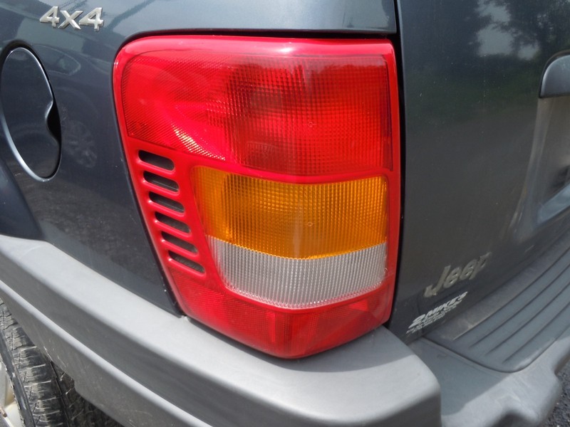 1999-2002 Jeep Grand Cherokee Tail Light Lamp Driver Left Thru 11/11/01