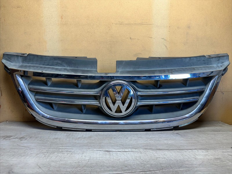 05109914AA I 09-14 VW ROUTAN GRILLE EMBLEM ASSEMBLY GENUINE FACTORY OEM