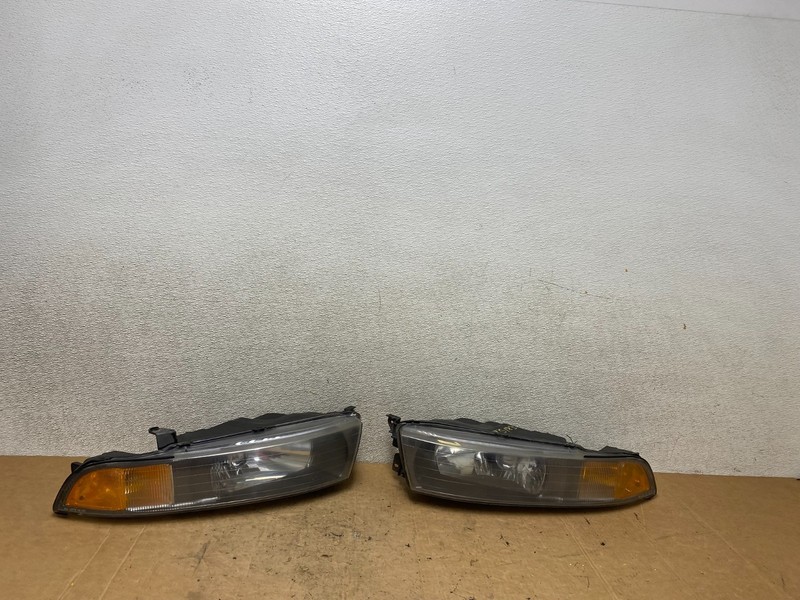 2002 to 2003 Mitsubishi Galant Left+Right Side Headlights T5183 DW