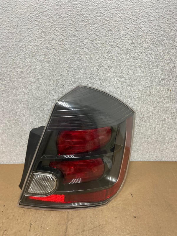 2007 to 2012 Nissan Sentra Right Passenger RhBlack Tail Light DEPO AC7295 LK
