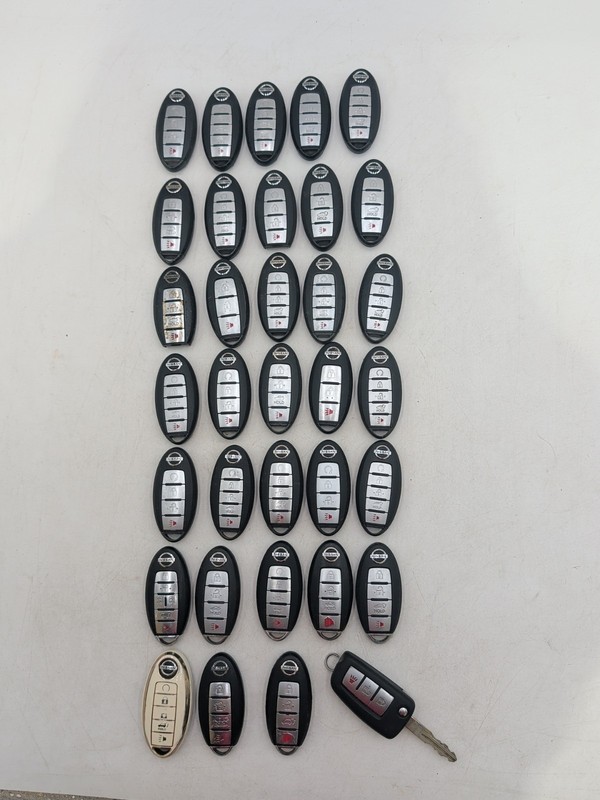 LOT OF 34 OEM NISSAN KEYLESS ENTRY REMOTE KEY FOB LOT