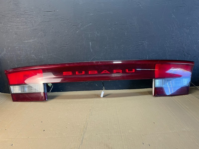 2000 to 2004 Subaru Legacy 4dr Sedan Trunk Center Tail Light Panel OEM AC9740 DG