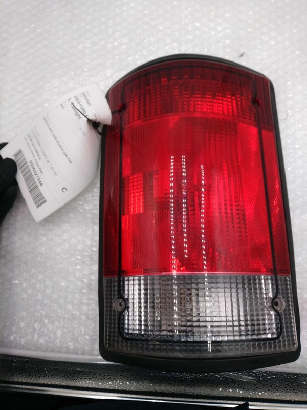 2014 Ford E150 Van Left Tail Light Assembly - Used, Scratches & Scuffs