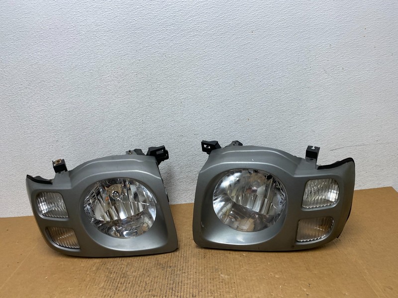 2002 2003 2004 Nissan Xterra Left+Right Side Headlights OEM AE0292 DW