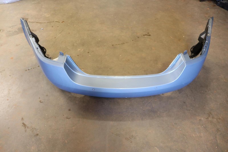 2007-2011 JAGUAR XK REAR BUMPER COVER PANEL W/ PARK ASSIST OEM