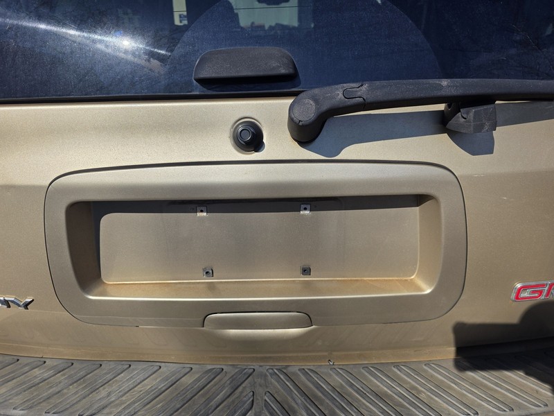 04-09 Chevrolet Trailblazer Envoy Gold 929L License Plate Holder Oem Tested