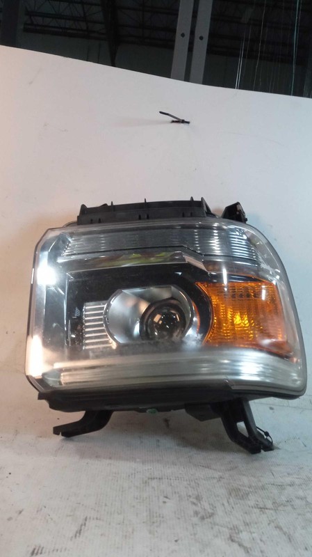2014 GMC Sierra 1500 Right Headlight Assembly - Used, Red, 119K Miles