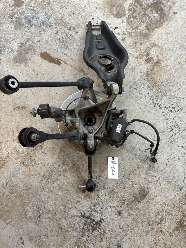 2017-20 Tesla Model 3 M3 Rear Left Spindle Knuckle Hub Caliper & Dust Shield 691