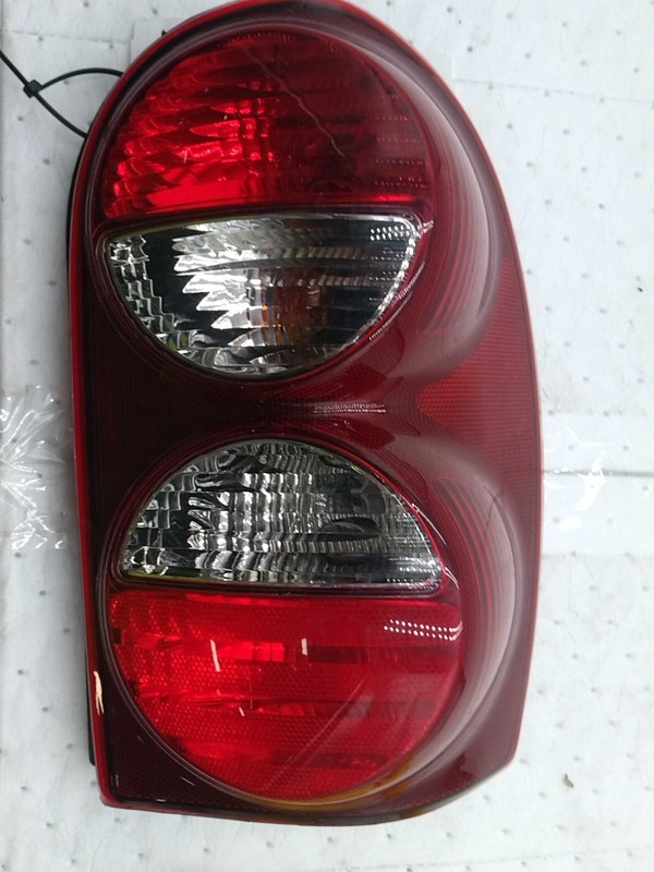 Used Right Tail Light Assembly fits: 2007 Jeep Liberty R. w/o tail lamp guard Ri