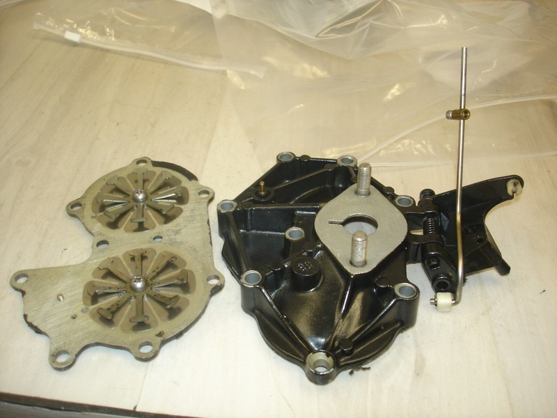 Evinrude Johnson 20hp332351 manifold & 396154 cam follower boat motor part