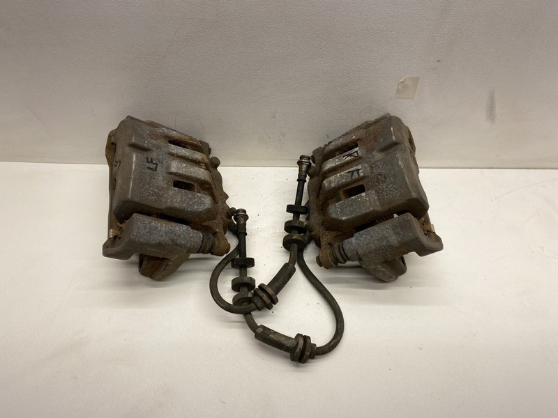 2014-2017 JEEP CHEROKEE LEFT AND RIGHT FRONT BRAKE CALIPER SET PAIR OEM