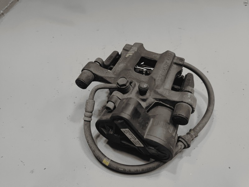 2016-2025 HONDA CIVIC REAR DRIVER DISC BRAKE CALIPER W/ PARKING ACTUATOR OEM
