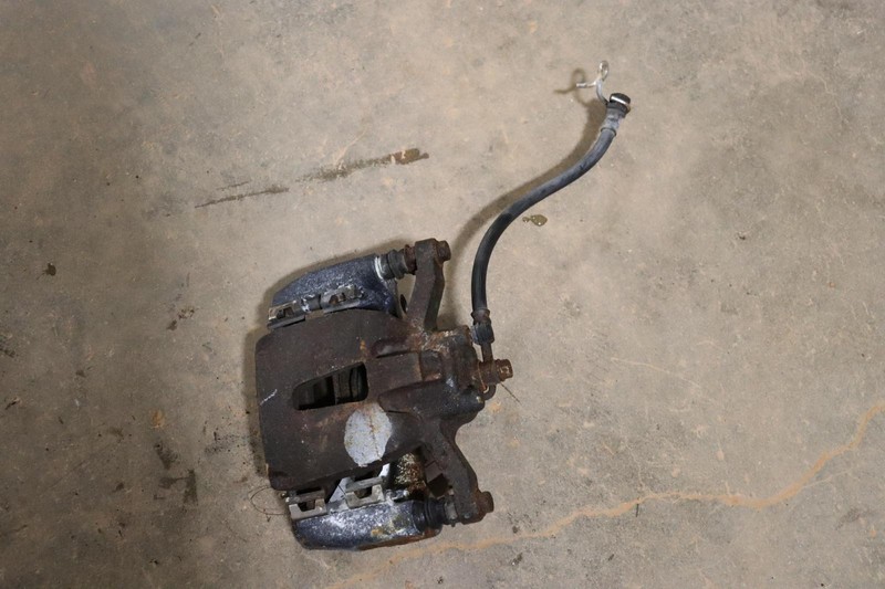 2012-2014 FORD PICKUP F150 REAR LEFT DRIVER SIDE BRAKE CALIPER W/ HOSE OEM