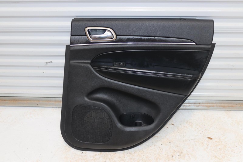 2016 JEEP GRAND CHEROKEE REAR RIGHT SIDE DOOR PANEL TRIM COVER OEM