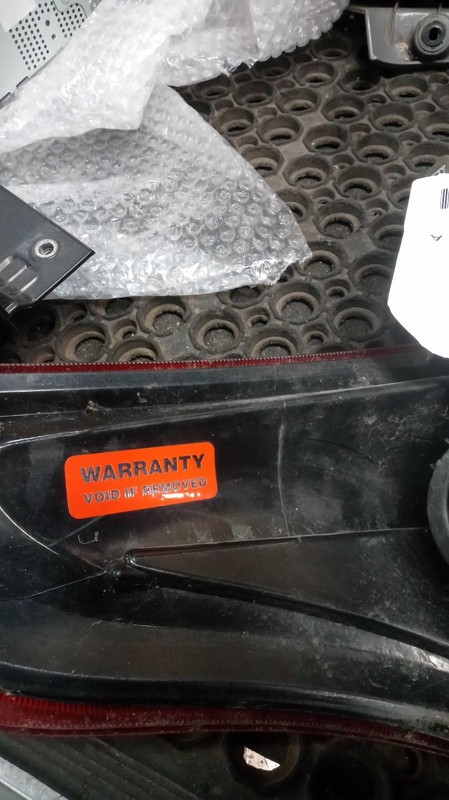 2017 Nissan Versa Right Tail Light Assembly - Used, Small Chip & Scratch