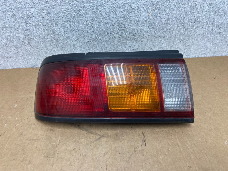 1993 to 1994 Nissan Sentra Left Driver LH Side Tail Light AD6136 DG