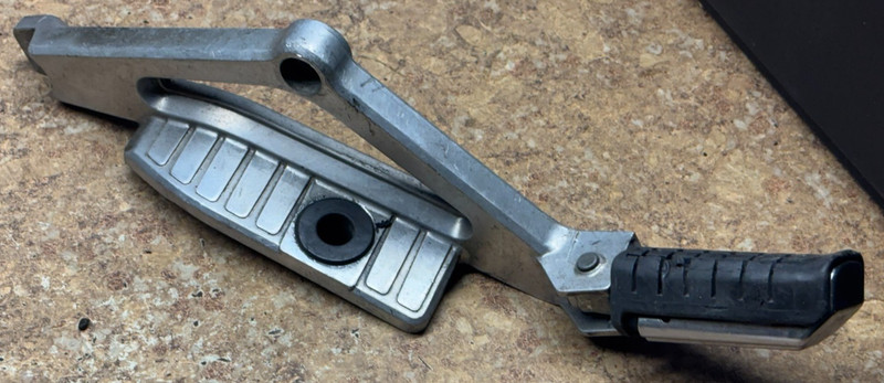 1984 Honda Nighthawk CB650SC Left Side Rear Foot Peg & Mount CB 650 SC CB650 F6