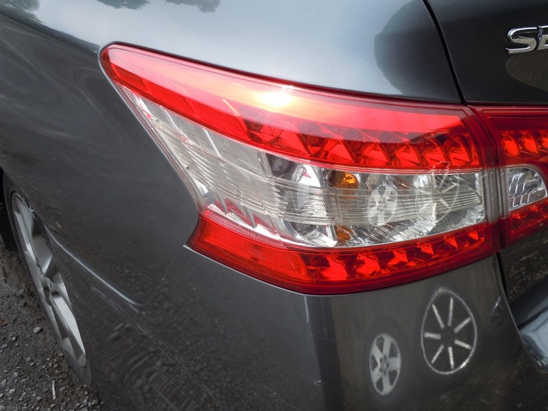 2013-2015 Nissan Sentra Quarter Panel Mounted Tail Light Driver Left OEM