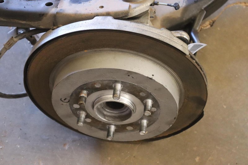 2011-2013 INFINITI QX56 2WD REAR RIGHT SPINDLE KNUCKLE HUB W/ CONTROL ARMS OEM