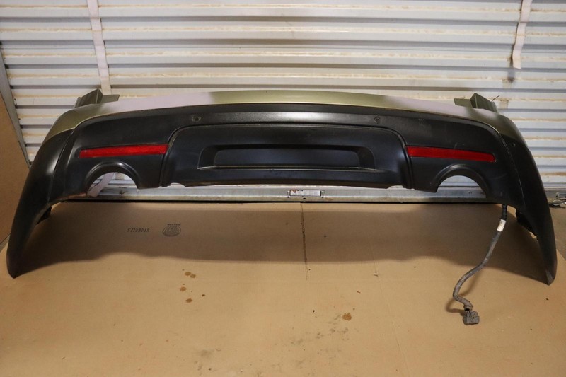2011-2015 FORD EXPLORER REAR BUMPER COVER W/ PARKING SENSORS OEM