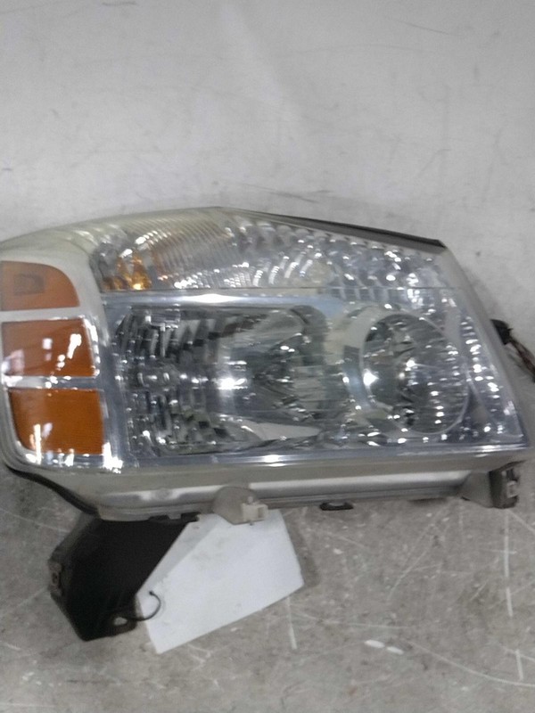 2005 Nissan Armada Right Headlight Assembly OEM 77565 Used 208K Miles