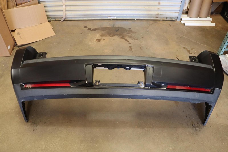 2015-2016 CADILLAC ESCALADE REAR BUMPER COVER BLACK W/ BLIND SPOTS OEM