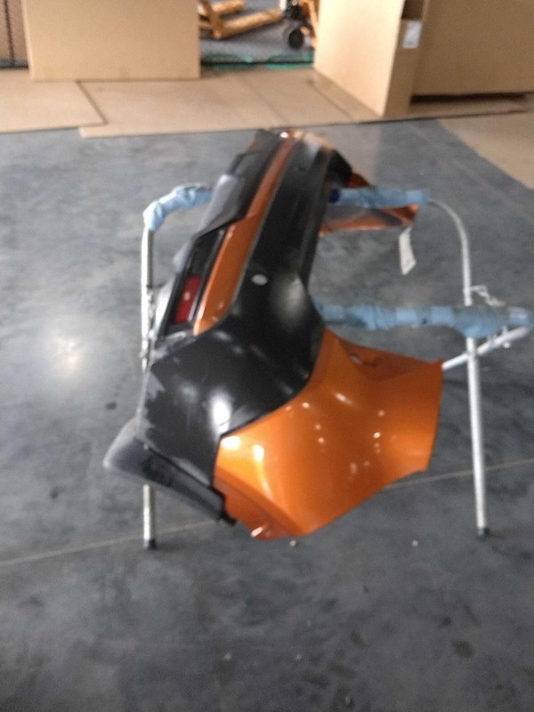2019 Nissan Kicks OEM Used Orange Bumper Assembly - 69000 Miles, Warranty