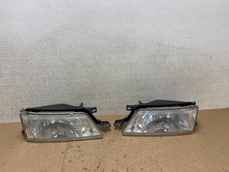 1997 to 1999 Nissan Maxima Left+Right Side Headlights Halogen OEM W1069 DW