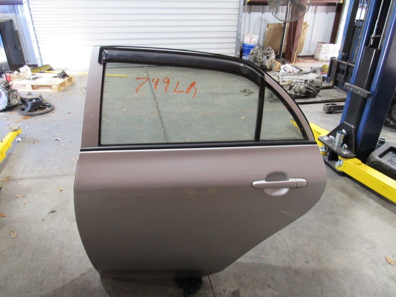 2009-2013 TOYOTA COROLLA LEFT DRIVER REAR ELECTRIC DOOR ASSY NORTH AMERICA BUILT