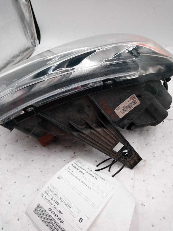 2015 Jeep Grand Cherokee Right Headlight Assembly Grey OEM Used 137068