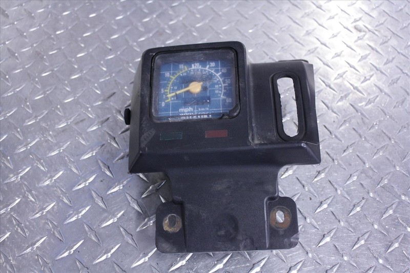 88 SUZUKI LT 300 E SPEEDOMETER SPEEDO GAUGE W/DASH PANEL TRIM SURROUND LT300